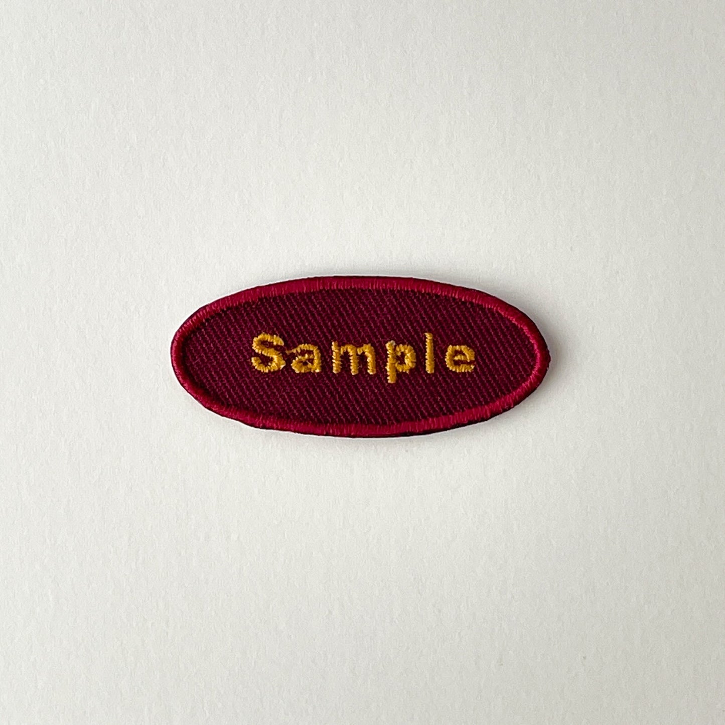 刺繍ネームワッペン/Mサイズ(約60mm)/シール・アイロン接着/楕円型/シンプルゴールド/3枚セット
