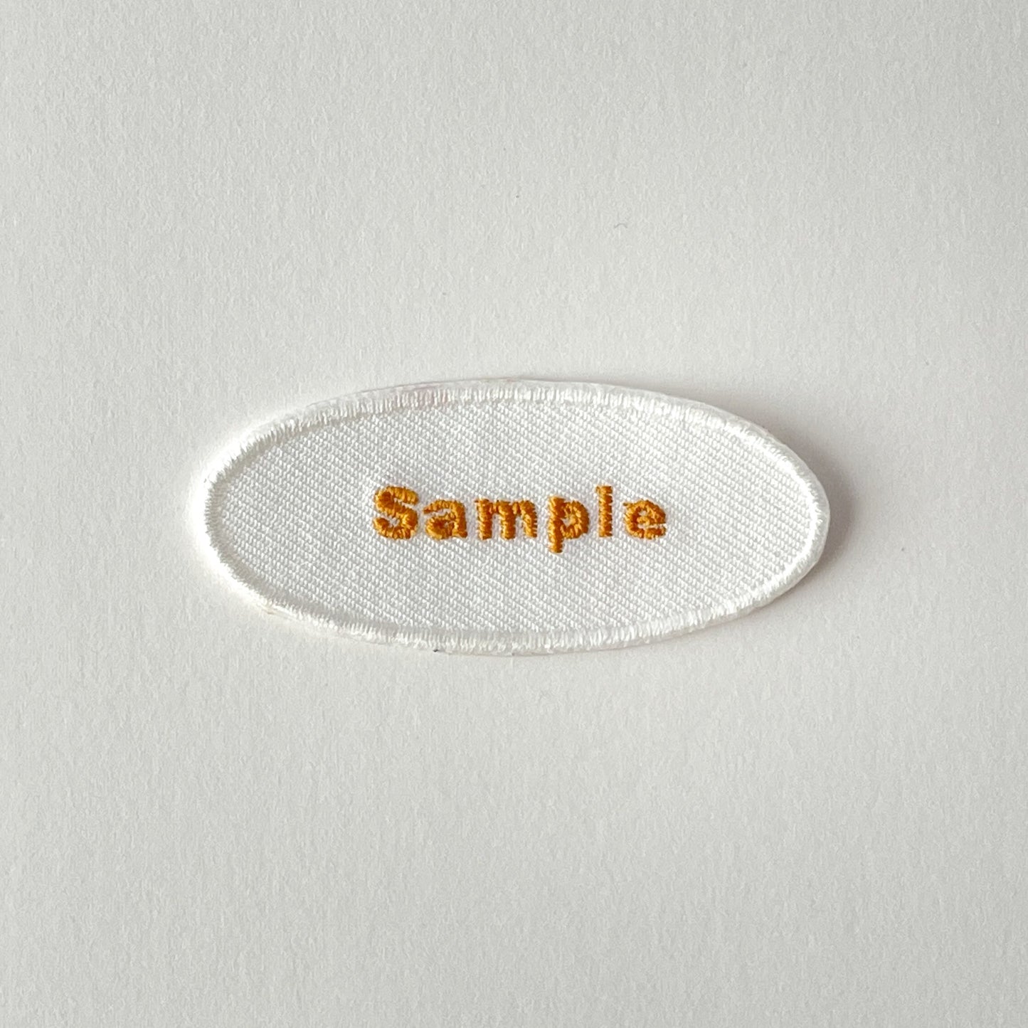 刺繍ネームワッペン/Mサイズ(約60mm)/シール・アイロン接着/楕円型/シンプルゴールド/3枚セット