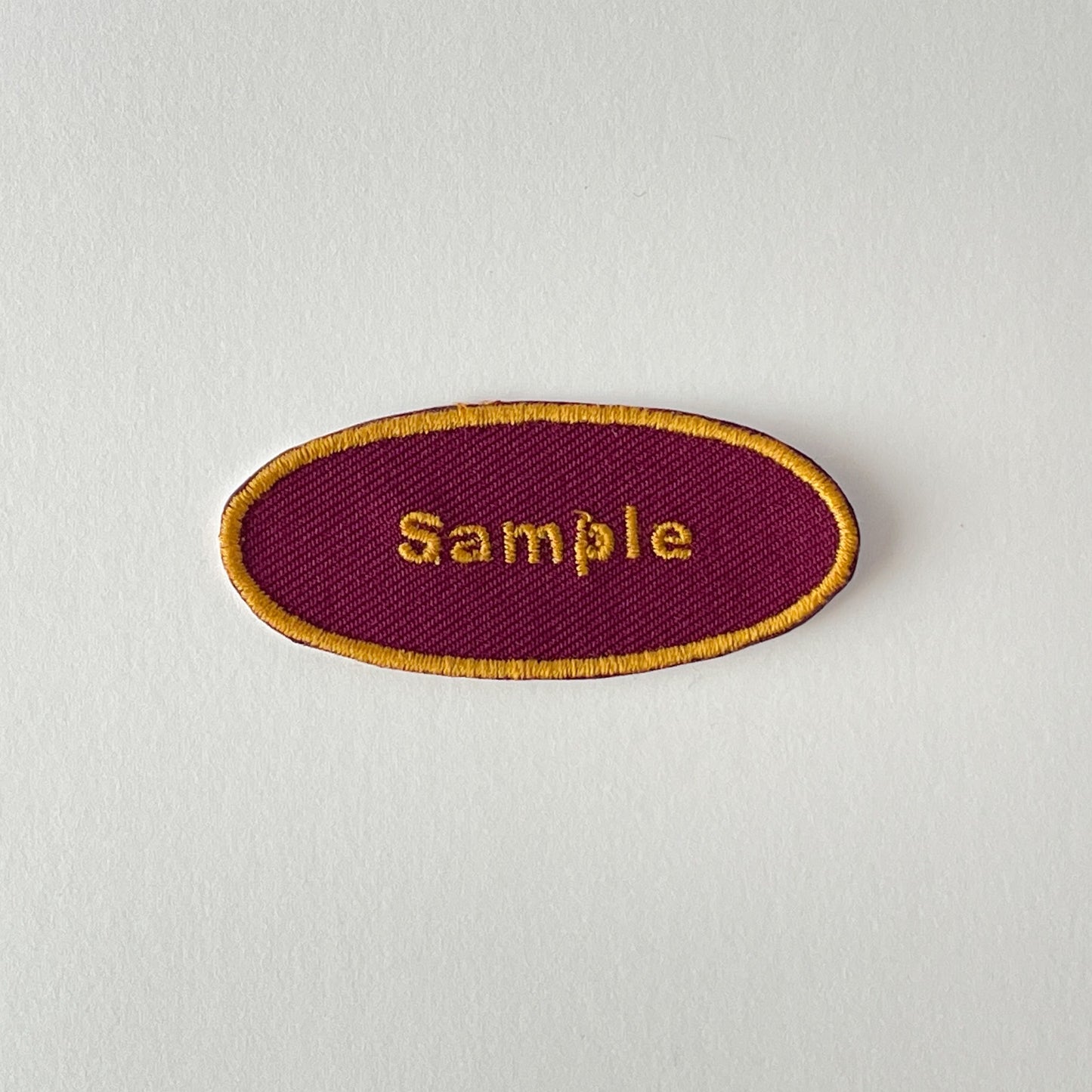 刺繍ネームワッペン/Mサイズ(約60mm)/シール・アイロン接着/楕円型/シンプルゴールド/3枚セット