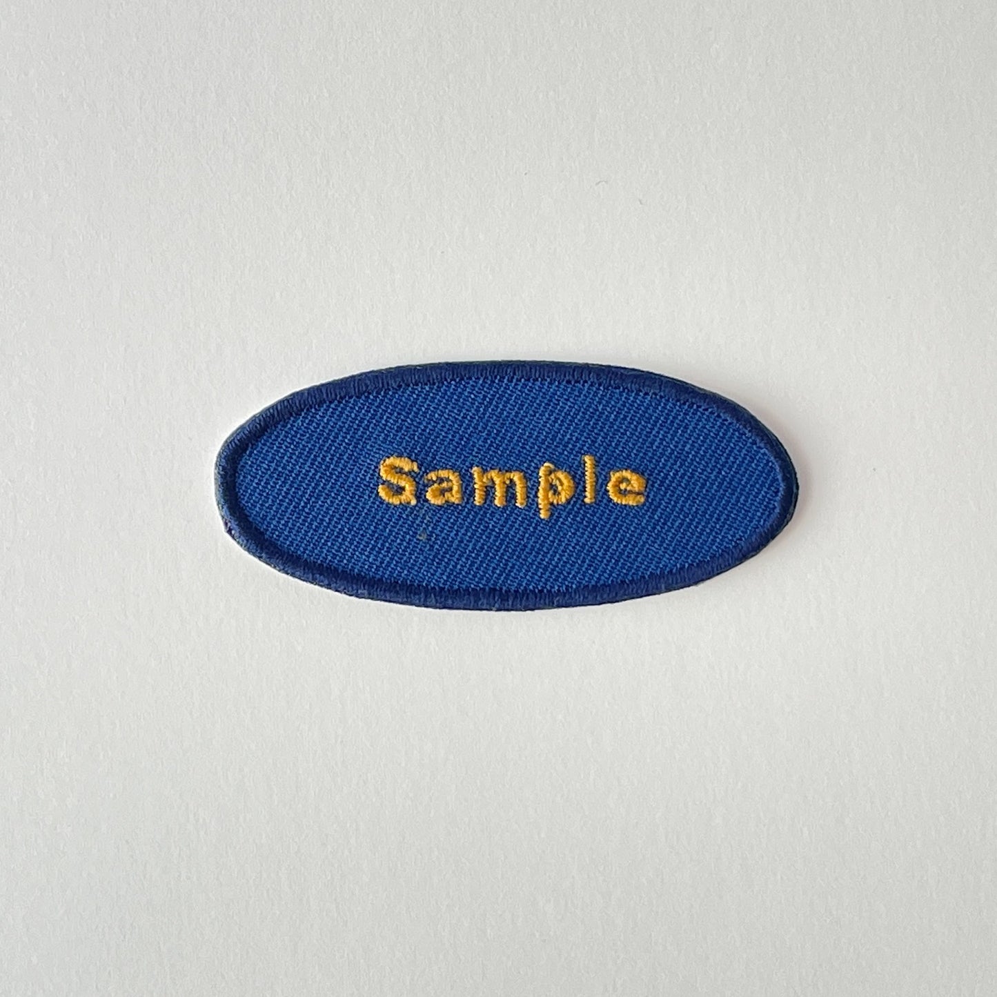 刺繍ネームワッペン/Mサイズ(約60mm)/シール・アイロン接着/楕円型/シンプルゴールド/3枚セット